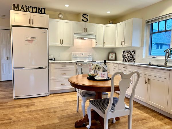 Kitchen in our Sooke Vacation Rental with a private patio is only steps from the ocean.