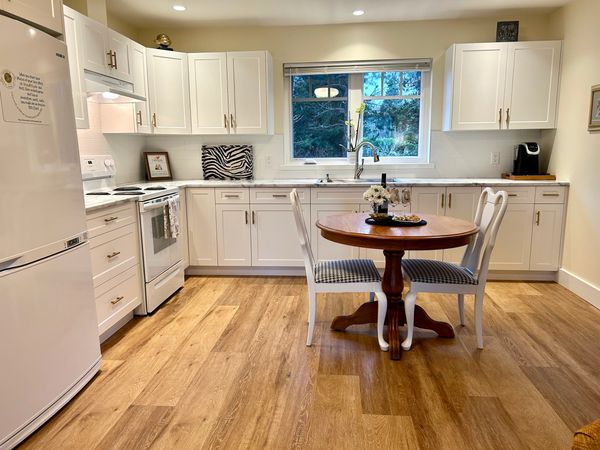 The self-catering kitchen is fully stocked with pots, a slow cooker, a coffee bar, and so much more.