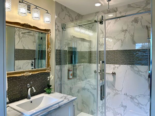 Shower stall with Rainhead shower head in our Sooke Vacation Rental