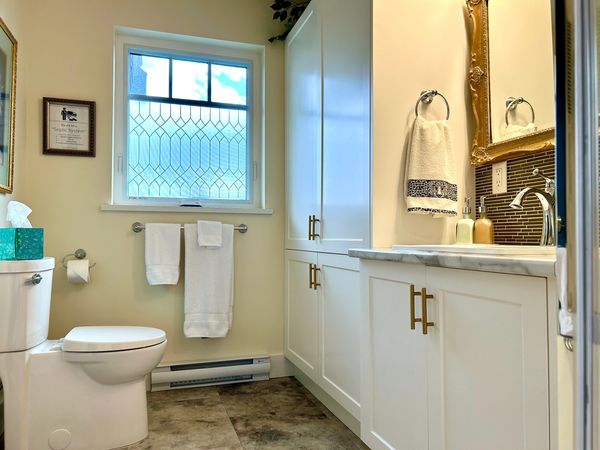 Washroom in our Sooke Vacation Rental with private patio is only steps from the ocean.