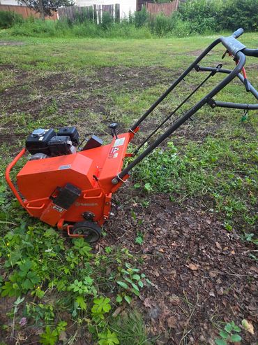 Husqvarna AR19 Core Aeration machine.