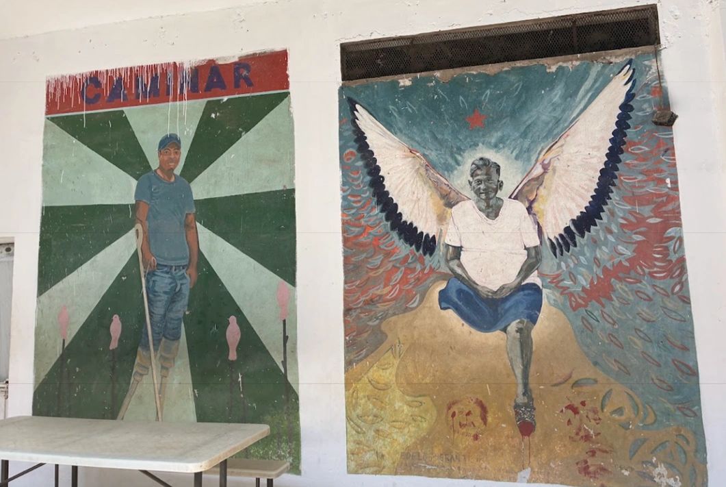 Murals depicting people with missing legs at Albergue Jesús el Buen Pastor. The shelter was initially opened to help migrants who were injured while riding atop La Bestia, a notorious train long used by mainly Central Americans trying to evade Mexican migration patrols en route to the US border. 