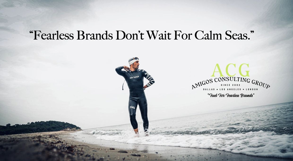A swimmer on a beach with the quote about fearless brands by Amigos Consulting Group.