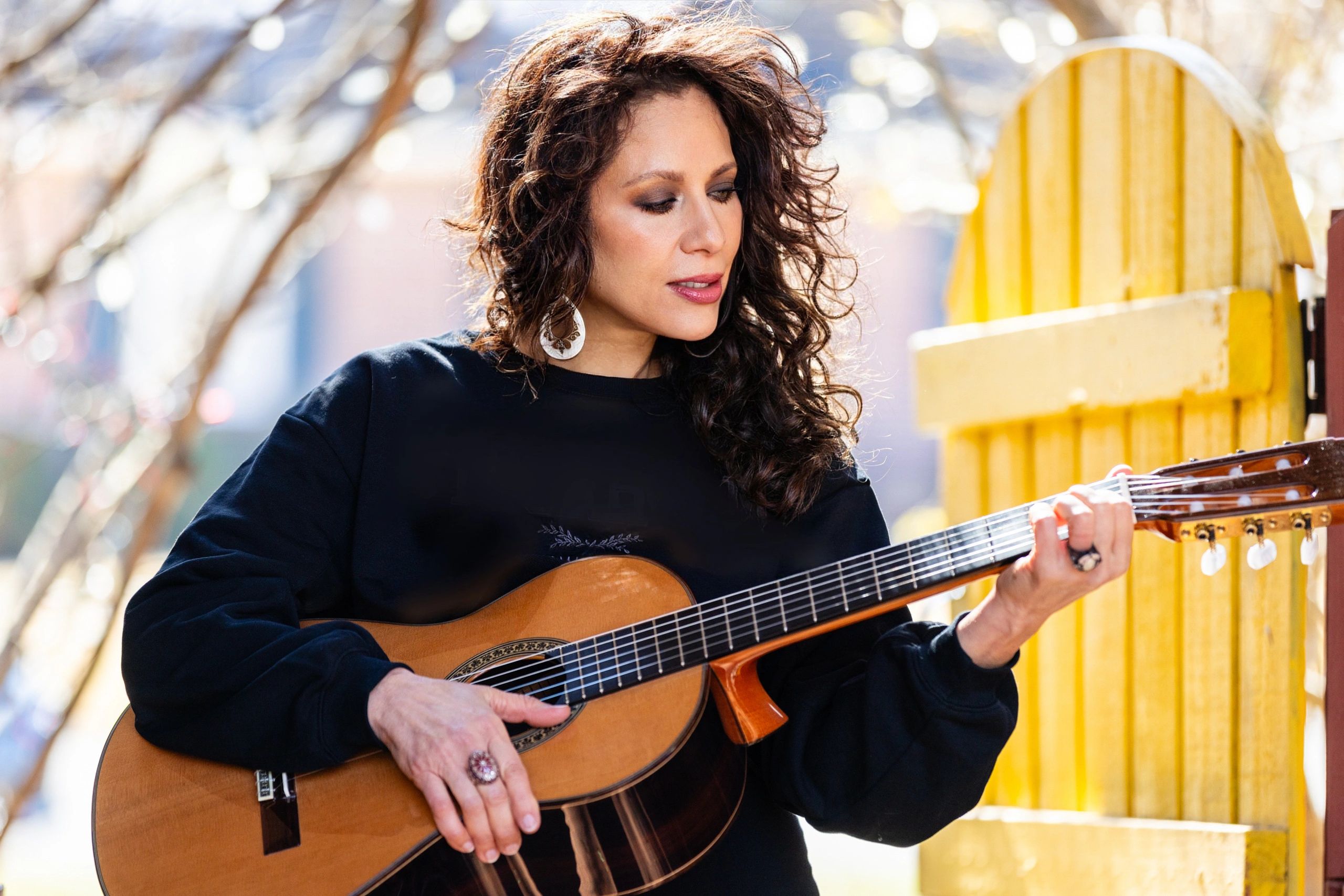 Women playing guitar.