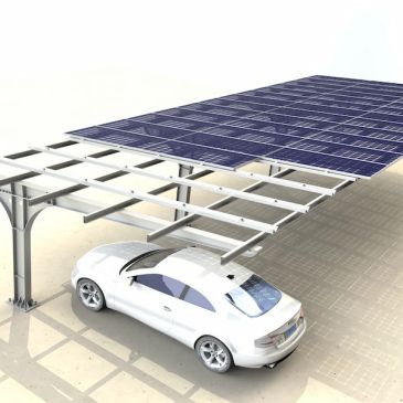 White car parked under solar panel carport.