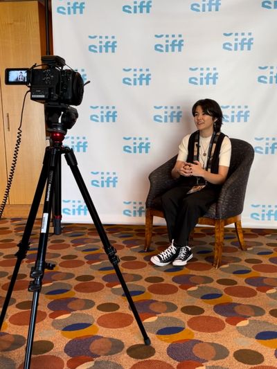 Sarah Kambe Holland doing a press interview at SIFF.