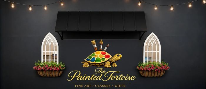 Logo of The Painted Tortoise on a dark wall with decorative windows and lights.