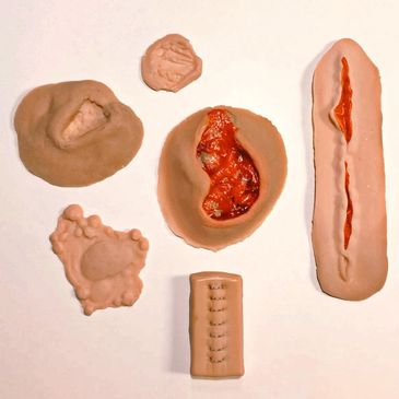Realistic silicone wounds used for emergency response or paramedic training.