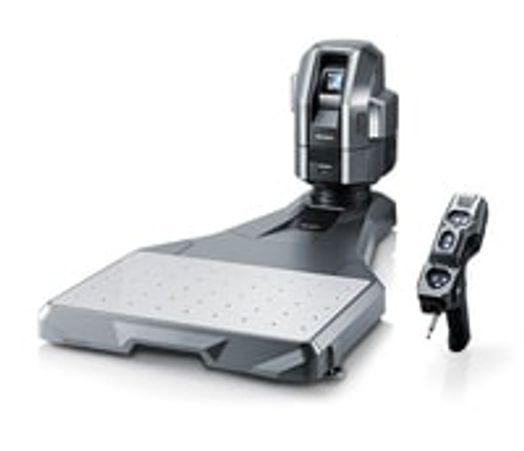 A modern robotic arm with a control panel on a platform.