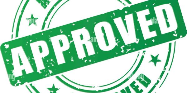 Green rubber stamp with the word 'APPROVED'.