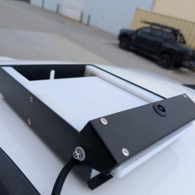 Australia Starlink Mini Mount mounted on a car roof with a lockable rear door for Australia.