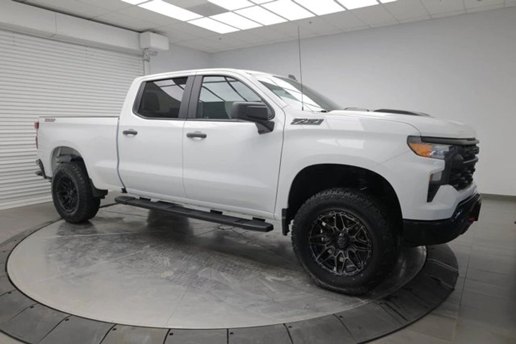 2023 Chevrolet Silverado 1500 Custom Trail Boss 4x4 white pickup truck for sale in Calgary, low mile
