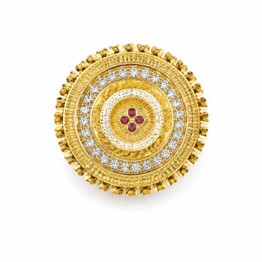 Gold circular brooch with diamonds and rubies.