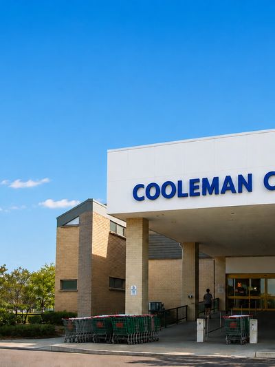 Entrance to Cooleman Court with shopping carts outside.