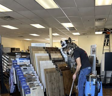 Person with a wolf mask in a flooring store.