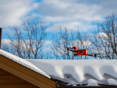 Autel EVO 2 640T dual drone flying over roof with snow issues.