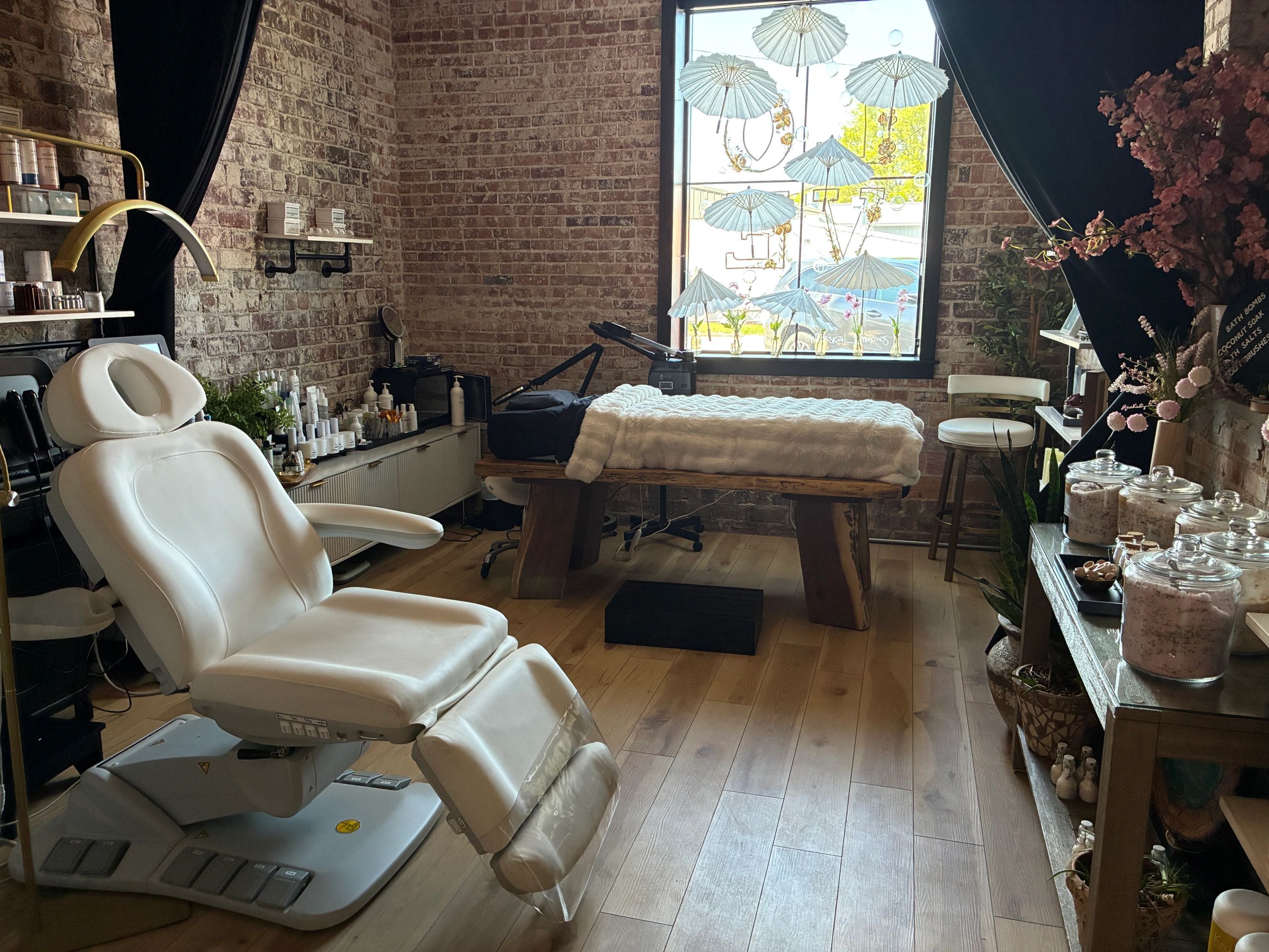 Clean, professional medical spa treatment room with neutral tones at Sashy Aesthetic Boutique in Ely