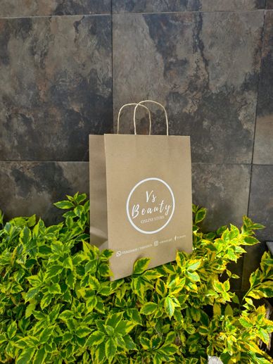 Bolsas de papel kraft con asas de papel torcidas