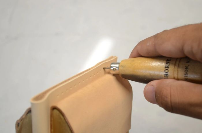 Using Sewing Awl On Leather