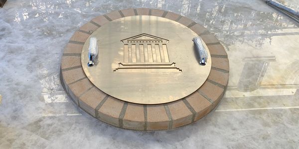Traditional brick tonir oven with circular  brick lining around the opening and 304 stainless steel 