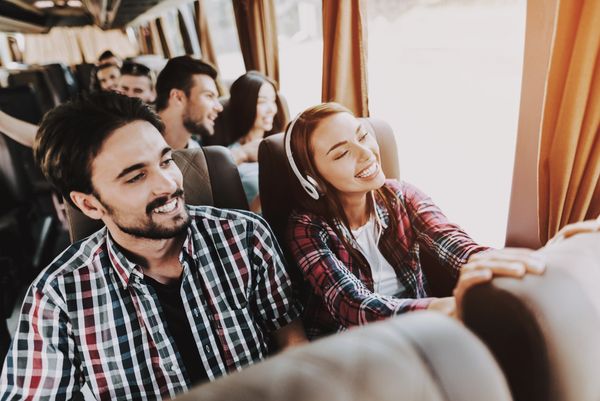 Charter Bus Happy Passengers