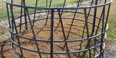 8' diameter, 3 piece bare steel bale feeder