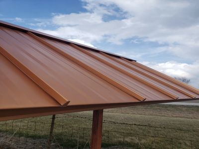 Metal roofing panels