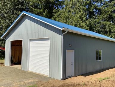1,600 square foot garage with two garage doors in the end and a workspace in the back. Rochester, WA
