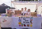 thee girls and their market stall