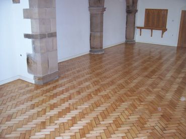Pitch Pine Herringbone Wood Floor in a Church repaired, filled, Sanded and Sealed