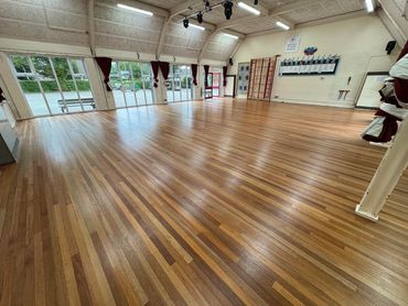 Keruing Hardwood Strip floor professionally machine sanded and sealed by Casewood Floors Ltd.
