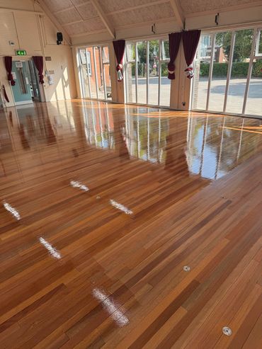 Last coat of water based two pack polyurethane sport lacquer being applied to Keruing Hardwood Strip