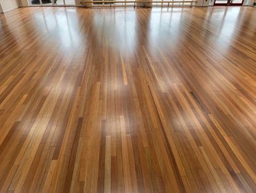 Sanded and sealed wooden floor in a school hall