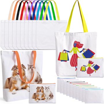 A group of white tote bags and straps of different colors. The bags have pictures of cats and dogs. 