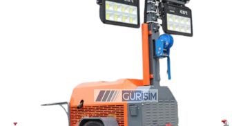 Portable construction floodlight tower with LED lights.