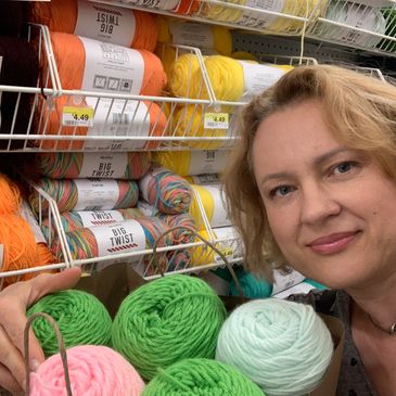 woman with yarn in a yarn shop