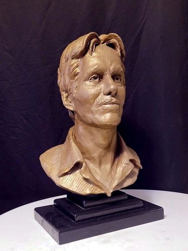 Life-size Bronze Portrait bust sculpture of a man with detailed facial features and shirt collar.
