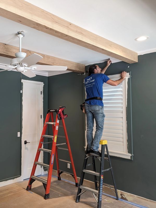 Testing crown molding against ceiling beams