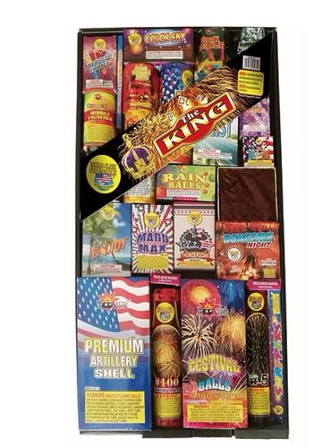 Box of assorted fireworks labeled 'The King' with various colorful firework packages.