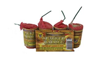 Four red firecrackers with fuses and a caution label on the packaging.