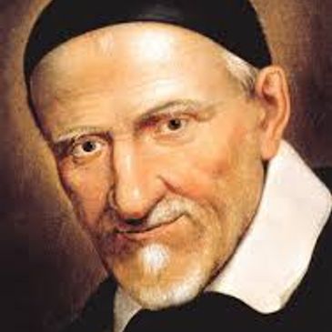 Portrait of an elderly man with a black cap and white collar.