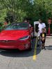 Fareed and CJ CJ charging up the Tesla. 
Timekeeper Company T's ON GO!
You better believe me. 