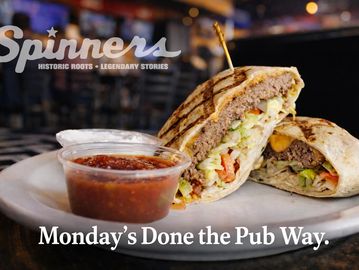 Grilled wrap with salsa at Spinners pub, promoting a great Monday meal.
