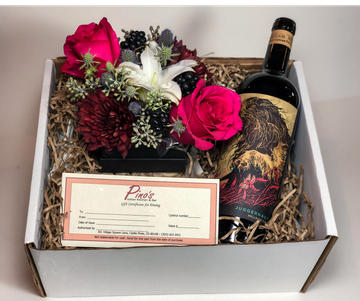 Gift box with flowers, wine bottle, and gift certificate.