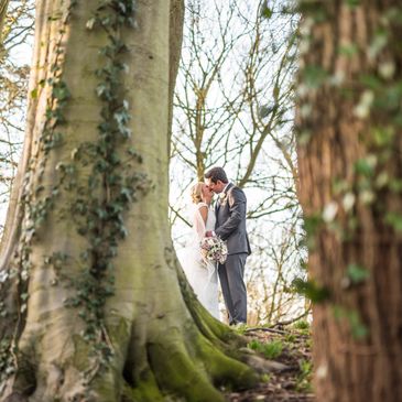 Image of bride and groom in the woods - wedding planning by Genepy Events