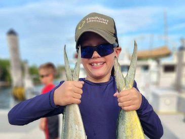 Happy guest who can't stop smiling about his day on the water in Miami.