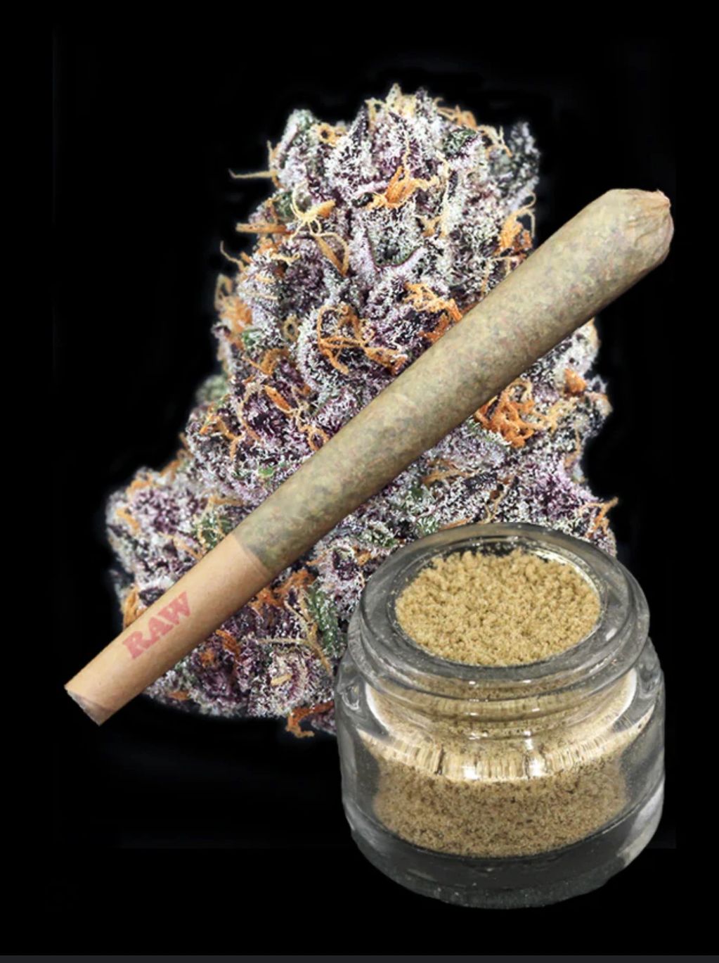 Cannabis bud, joint, and kief in a jar on black background.