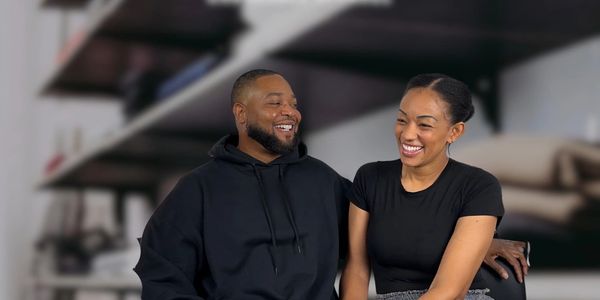 A loving couple laughing 