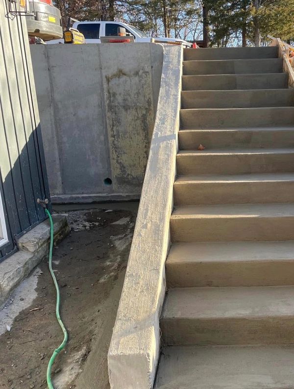 After demolition and pour of new stairs 