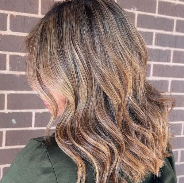 highlights on a chocolate brown long layered haircut